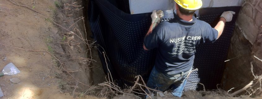 Waterproofing contractor in Toronto applying waterproofing membreane